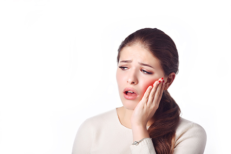 Young Woman with Infected Tooth